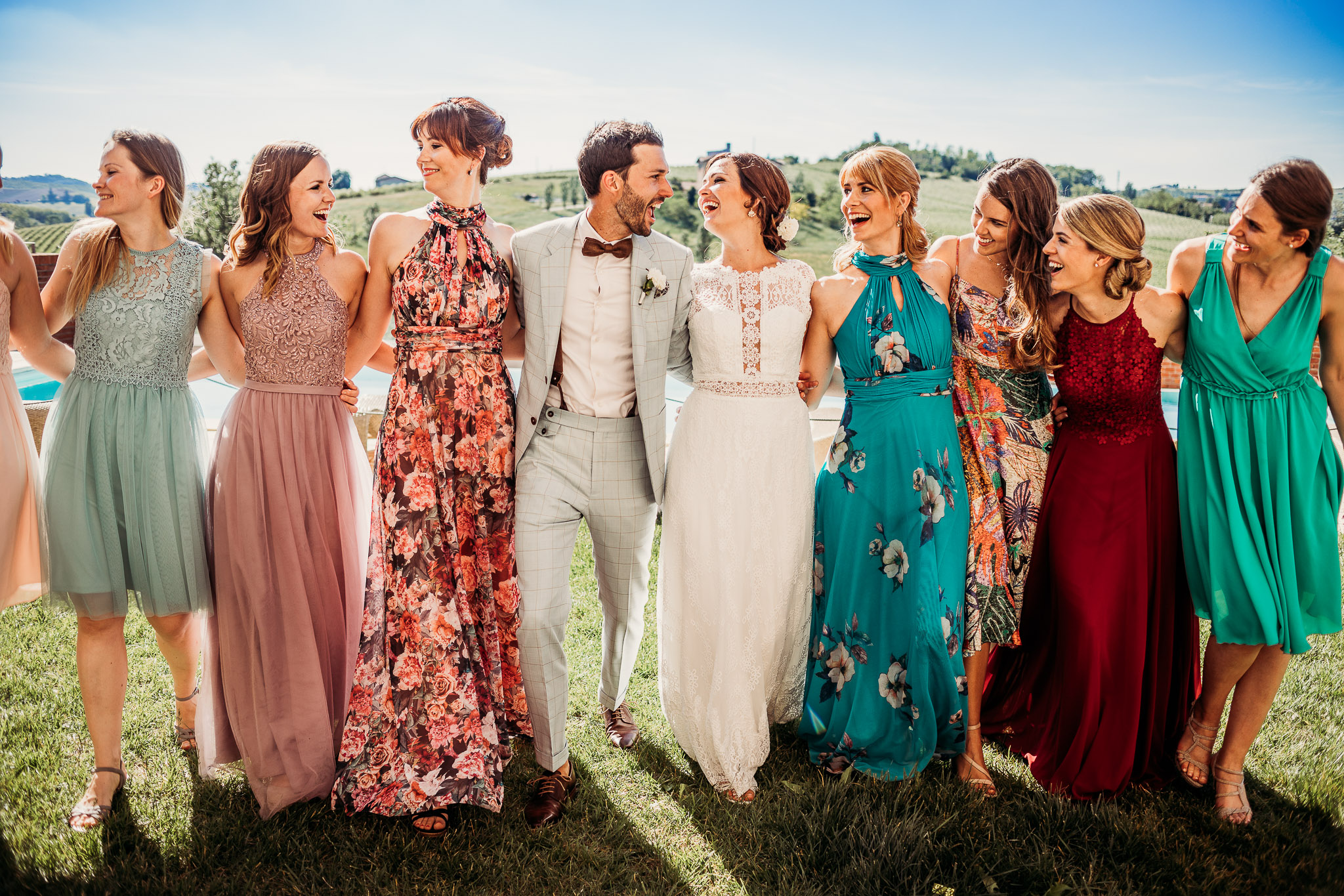Bride and groom with bridesmaids at Cascina Faletta, Italy